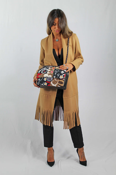 Matelasse' bag in genuine leather and plush fabric Apiedinudinelparco