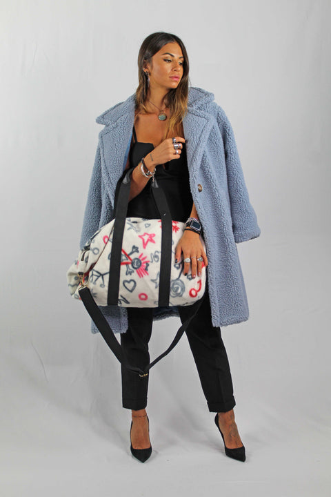 Duffle bag in plush fabric and genuine leather Apiedinudinelparco