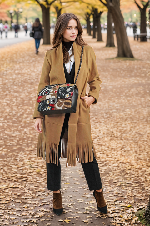 Matelasse' bag in genuine leather and plush fabric Apiedinudinelparco