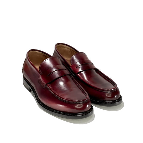 Penny loafers in polished skin