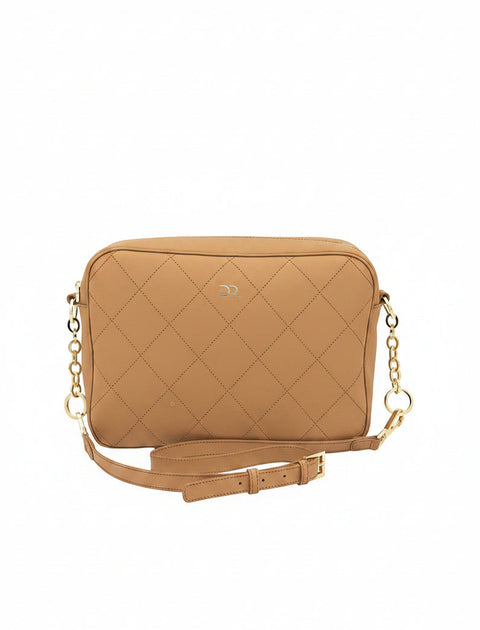A tan quilted leather crossbody bag with a diamond pattern, gold chain strap, and a matching adjustable leather strap with a gold buckle, shown on a plain white background.