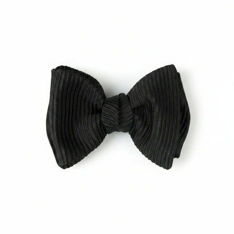 Black bow tie on a white background