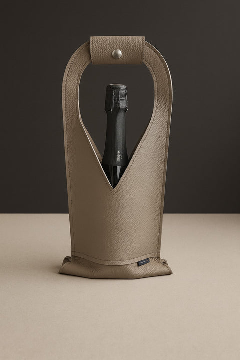 Vertical bottle holder with strap decorated with button